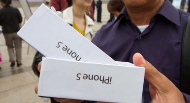 Apple, уменьшила заказ на дисплеи для своего последнего смартфона, iPhone 5.