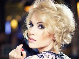 Anul acesta, Olia Tira a fost desemnată cea mai sexy femeie din Moldova, de către o revistă autohtonă.