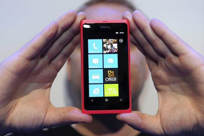 Финская Nokia на выставке в Нью-Дели представила смартфон Asha 501 с сенсорным экраном за 99 долларов.