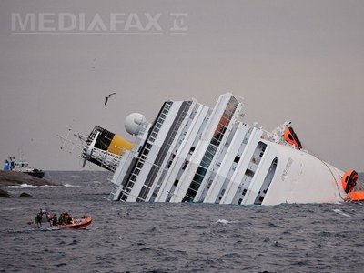 NAUFRAGIUL COSTA CONCORDIA: Stânca de pe insula Giglio, care a provocat tragedia, va fi dislocată (Imagine: Mediafax Foto/AFP)
