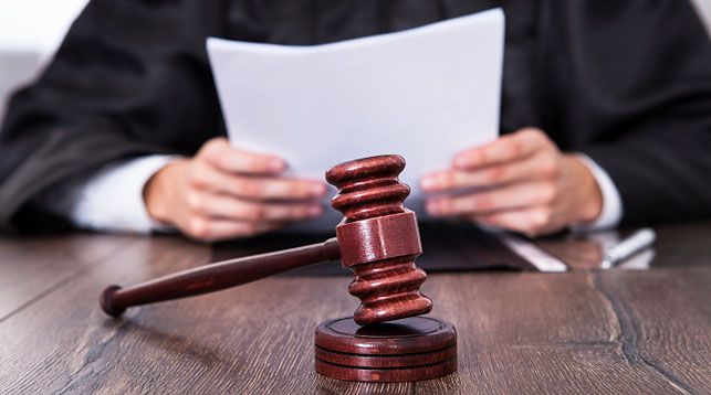 За совершенные преступления суд приговорил подозреваемого к 17 годам тюрьмы.  Фото: belta.by