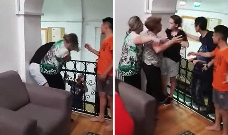 На опубликованном видео видно, как женщина схватила девочку за шею и прижала к лестнице.