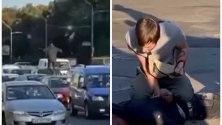 В Киеве парень бегал по крышам автомобилей.