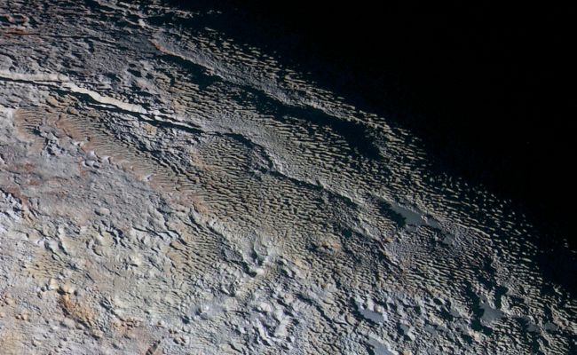 Получены новые цветные фотографии Плутона. Фото: Nasa.gov