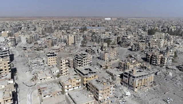 Siria: Două gropi comune au fost descoperite în apropiere de Raqqa. Foto: AFP