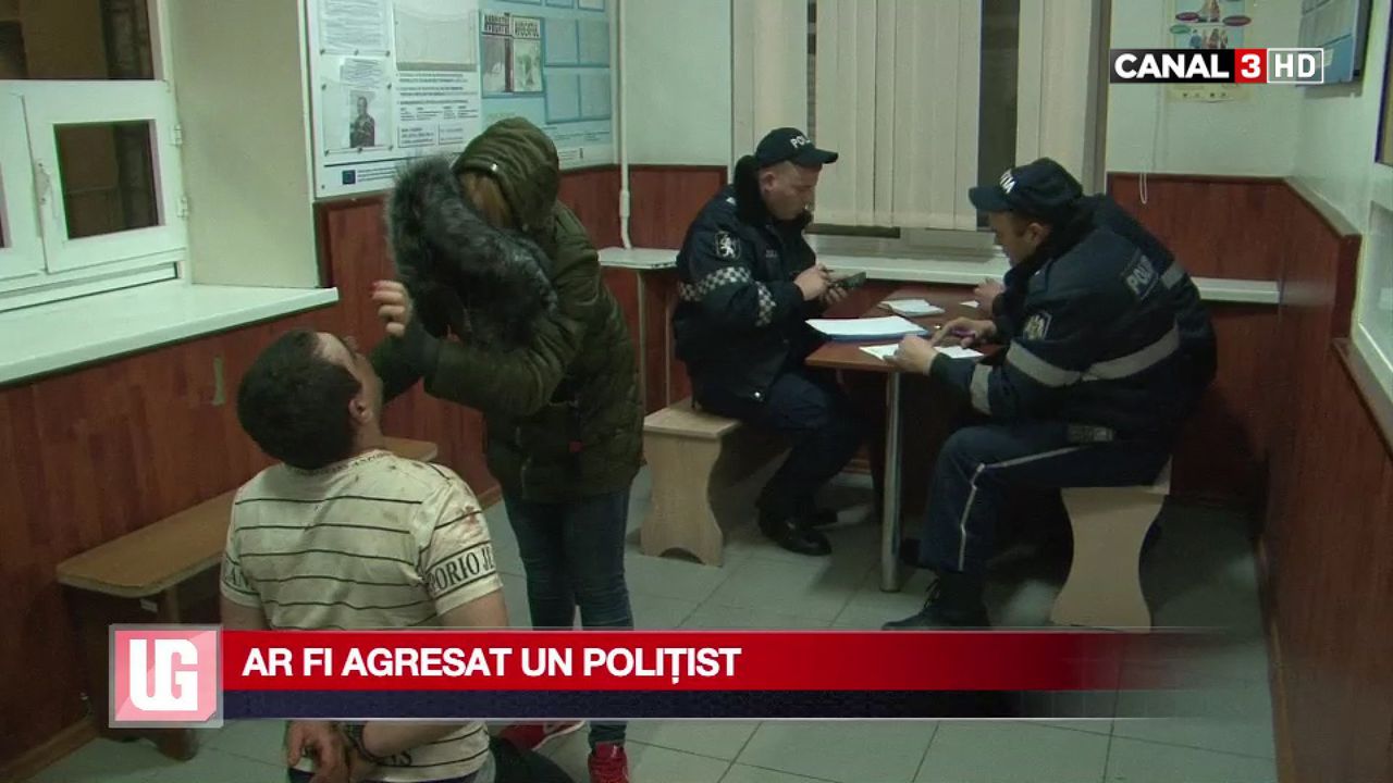 Un bărbat, încătușat după ce ar fi agresat un polițist