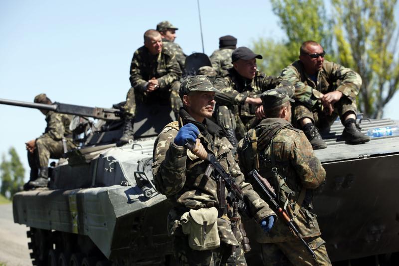 Беженцы обстреляны у блокпоста Нацгвардии в районе Стукаловой Балки.   Фото: vm.ru
