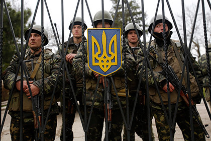 Украинские военнослужащие. Фото: Darko Vojinovic / AP