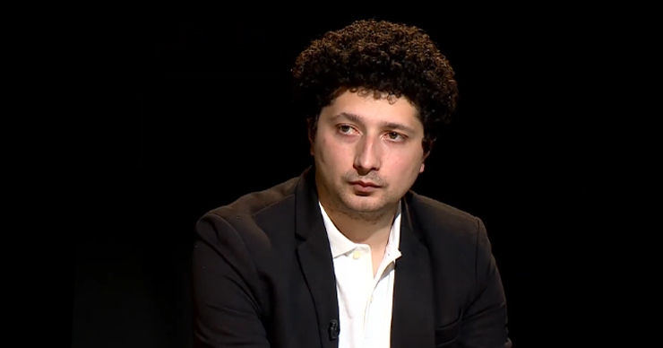 Депутат PAS Раду Мариан.