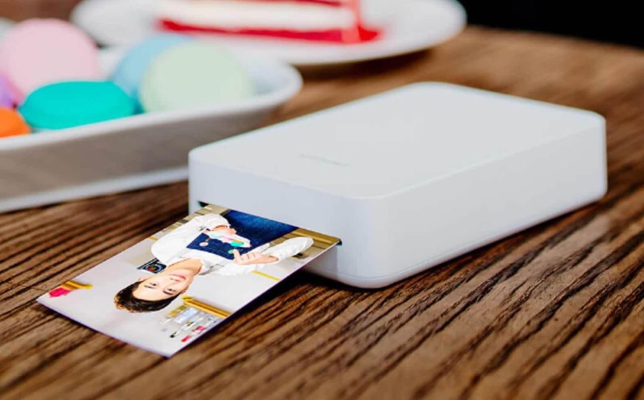 Huawei создала фотопринтер для смартфона.