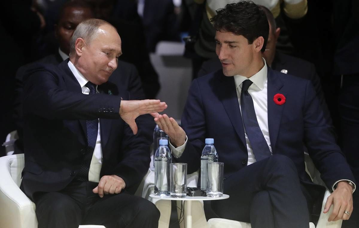 Владимира Путин и Джастин Трюдо.