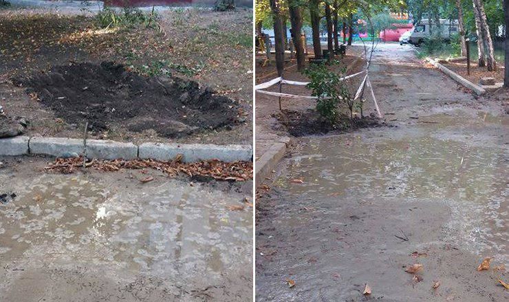 В Кишиневе рабочие засыпали яму на дороге землей.