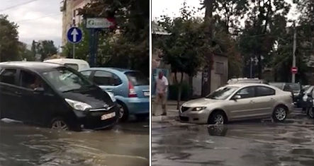 Столичные водители угодили в ямы на дорогах после проливного дождя.