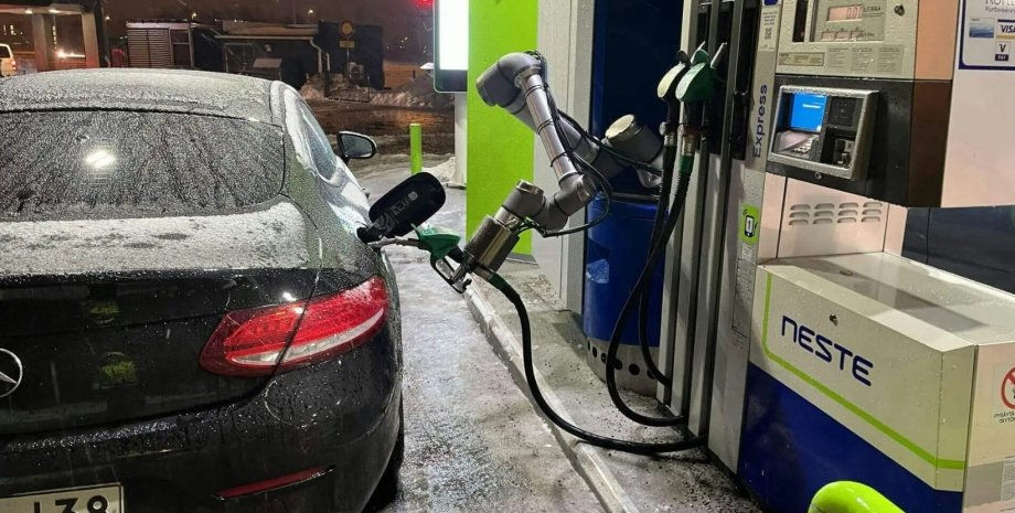 Автомобили в Китае начали заправлять роботы.
