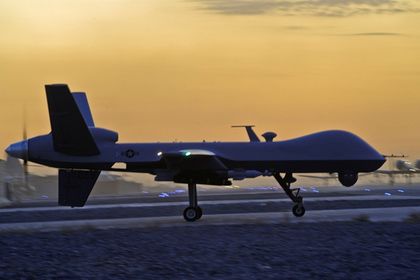 Беспилотник с подвесными ракетами Hellfire.    Фото: Reuters
