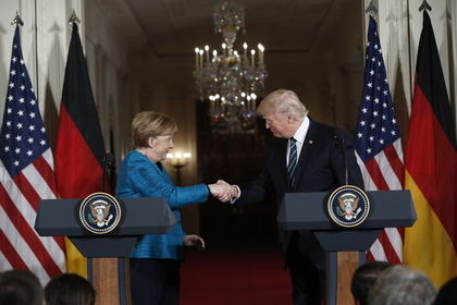 Ангела Меркель и Дональд Трамп. Фото: Pablo Martinez Monsivais / AP