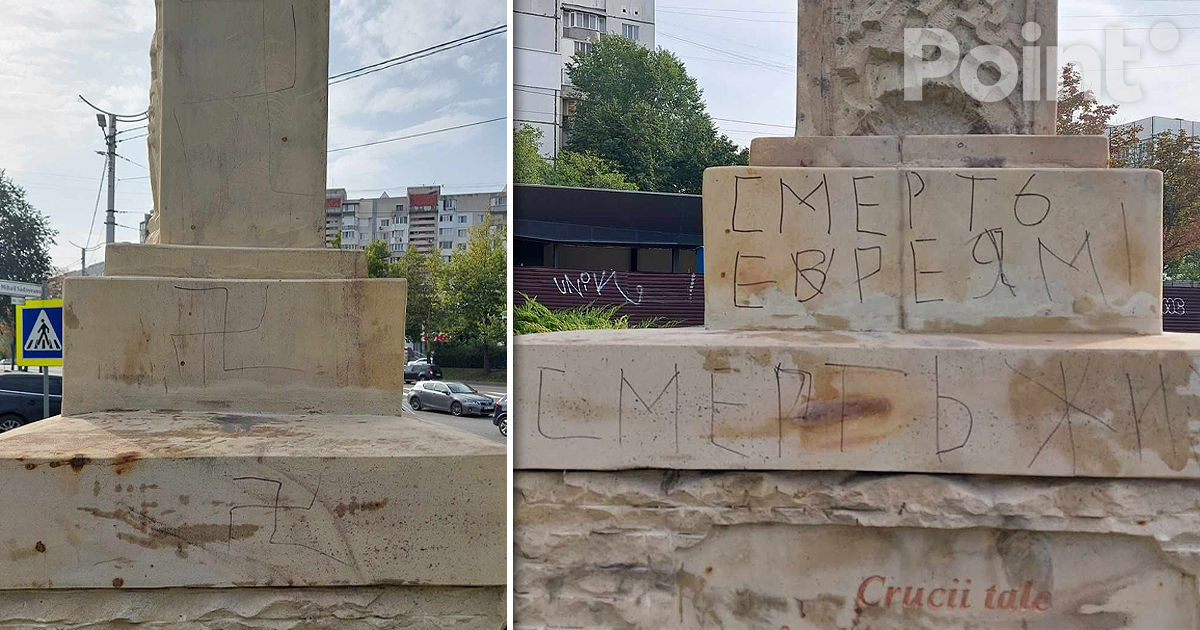 Un crucifix din Capitală, profanat cu simboluri fasciste și inscripții antisemite.