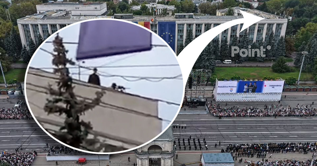 На крыше здания правительства во время парада заметили снайпера и вооруженных сотрудников.