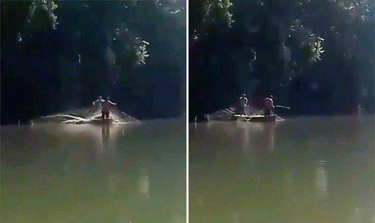 На видео видно, как два человека проверяют сетки, установленные в реки Днестр
