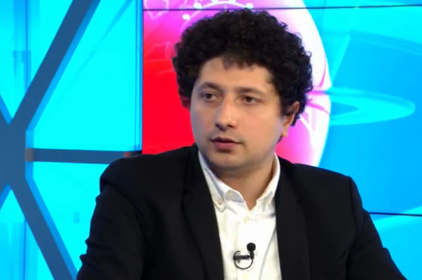 Депутат PAS Раду Мариан.
