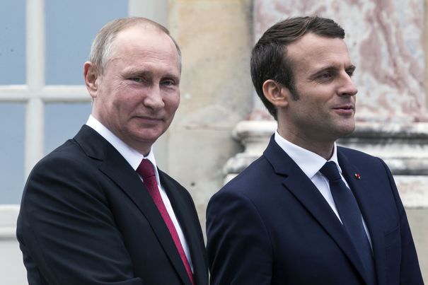 Putin şi Macron au discutat despre procesul de pace din Siria. Foto: mediafax.ro