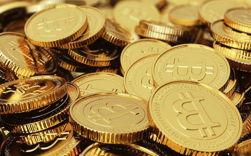 Стоимость биткойна снизилась до $62 тыс после обновления рекорда.