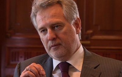 D результате Фирташ был вынужден окружить себя "армией телохранителей".