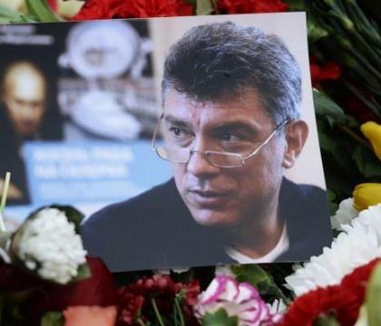 Putin a condamnat public asasinatul si a promis ca cei vinovati vor fi adusi in fata justitiei.