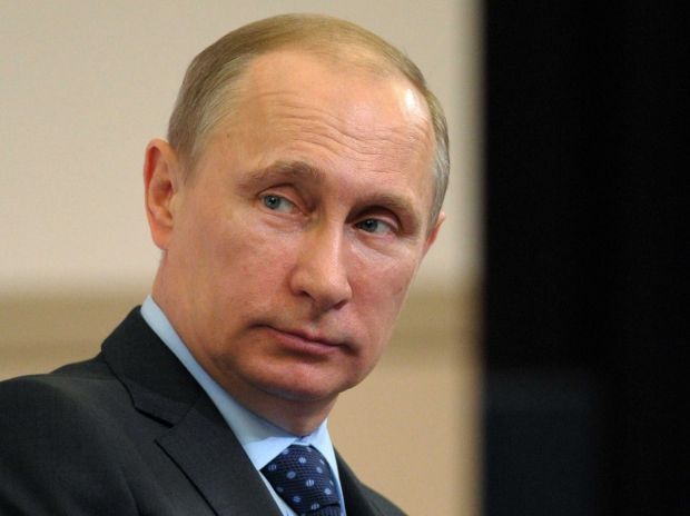 Vladimir Putin a dat e înţeles că ar putea să nu mai candideze pentru un nou mandat la alegerile prezidenţiale din 2018. Foto: businessinsider.com.au