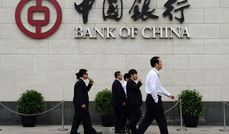 Zeci de mii de oameni sunt concediaţi din băncile chineze. Foto: cnbc.com