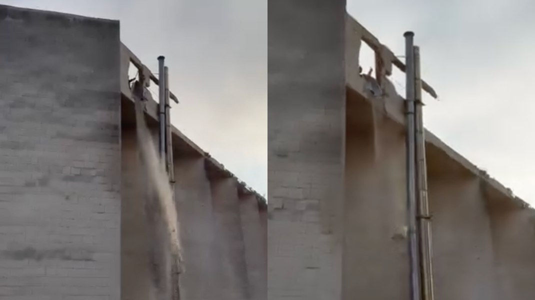 Moloz, aruncat de pe clădirea Hotelului Dacia din cauza unui tub deteriorat.
