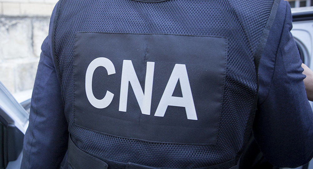 CNA a reținut o persoană: Încerca să mituiască angajații CRIS Registru