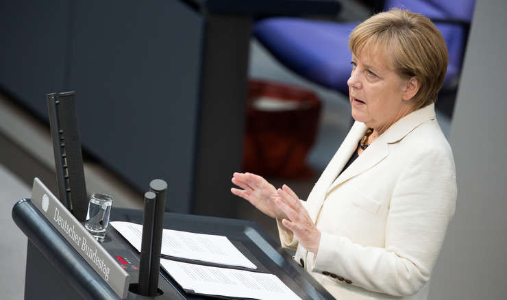 Angela Merkel, deplasare complicată la Varșovia.