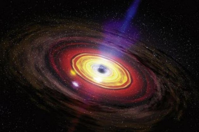 În centrul galaxiei noastre, Calea Lactee, există o gaură neagră masivă.
