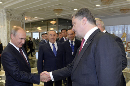 Президент России Владимир Путин и президент Украины Петр Порошенко.