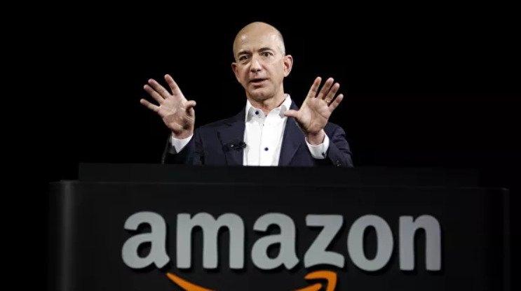 Amazon экспериментирует с оплатой простым взмахом руки.