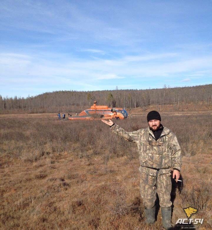 Новосибирские геофизики устроили фотосессию на фоне упавшего вертолёта