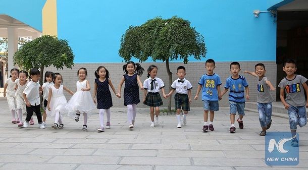 В Китае семь пар близнецов пошли в один класс