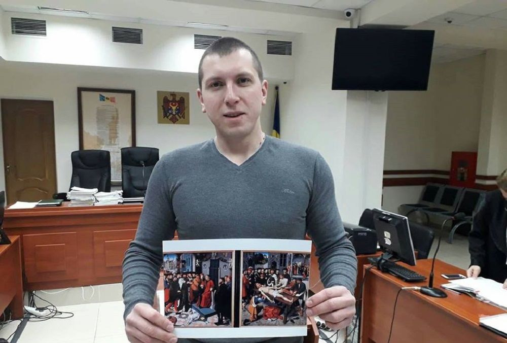 Член "группы Петренко" принес в суд необычную картину