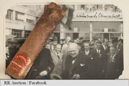 Un trabuc fumat doar pe jumătate de Churchill, vândut la licitație cu suma de 12.000 de dolari