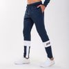 Pantaloni de trening Joma - FREEDOM MARINO-BLANCO