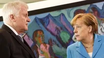 Surse: Un important ministru german cere expulzarea migranţilor
