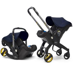 Автокресло-коляска Doona Royal Blue (0-13 кг)